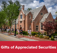Students walking on campus. Gifts of Appreciated Securities 